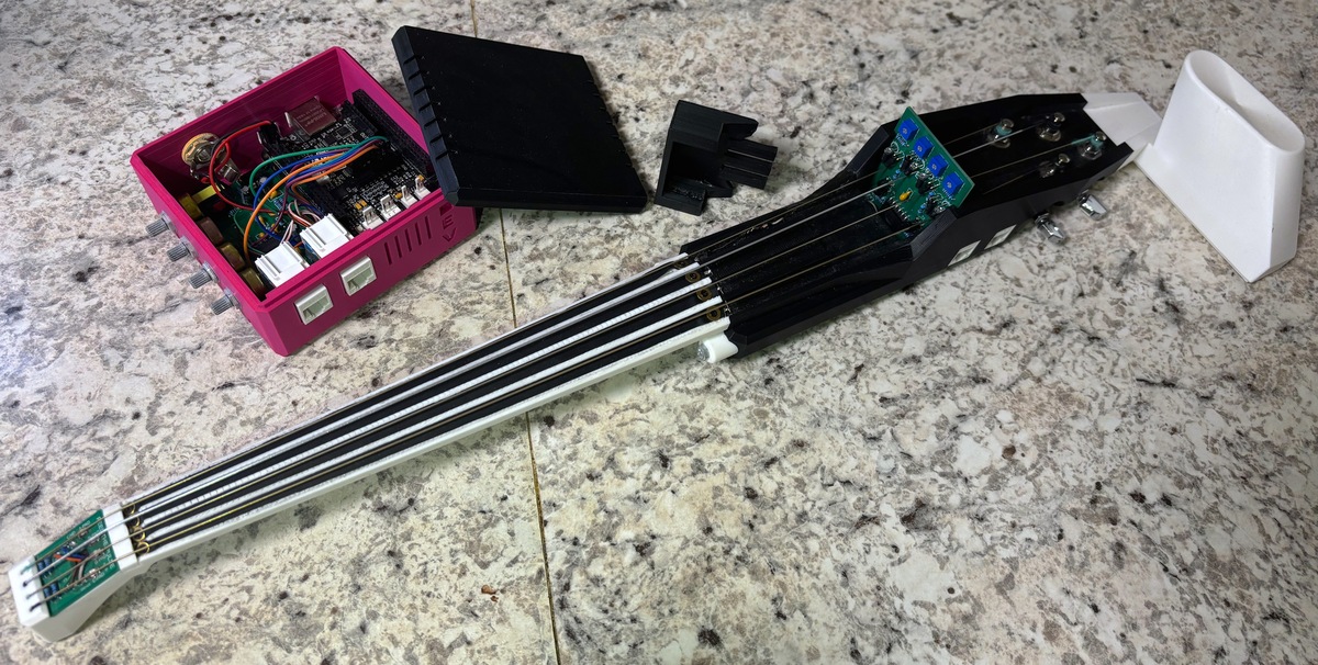 The EV: An Iterative Journey in Digital-Acoustic String Instrument Augmentation