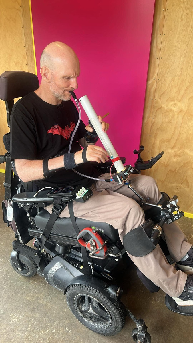 The Slide-A-Phone: a Tactile Accessible Musical Instrument