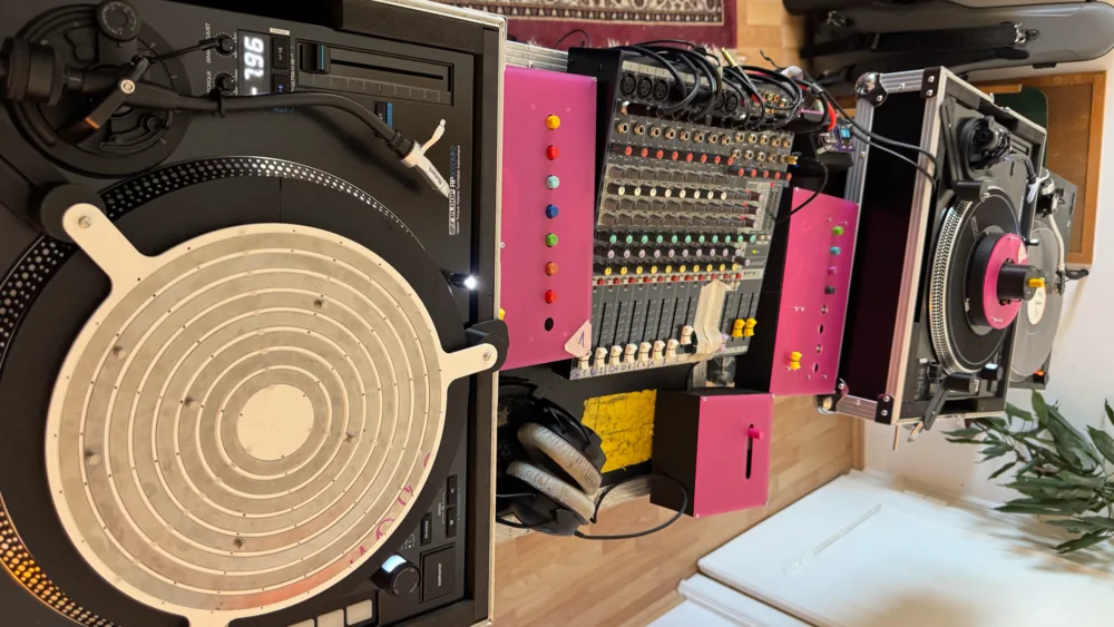 Turntangilism: Enhancing traditional Turntable Setups with Tangible Controls for Digital Sequencing and Live Sampling
