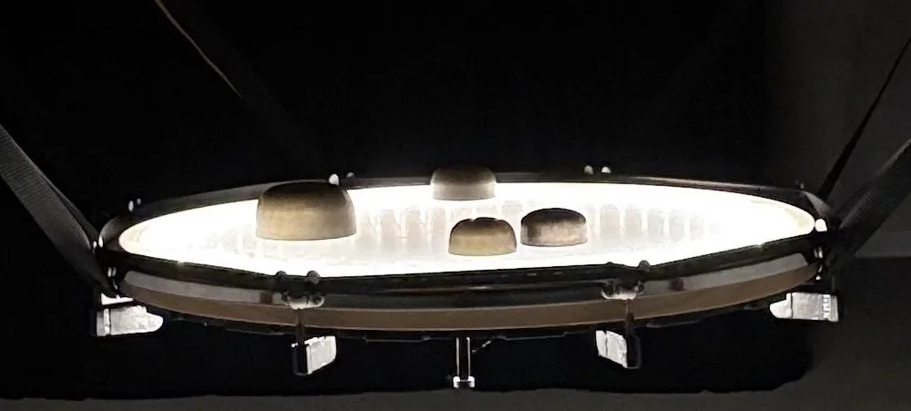 Recipe for a ghost catcher: an infrasound-powered hybrid instrument-sonic installation