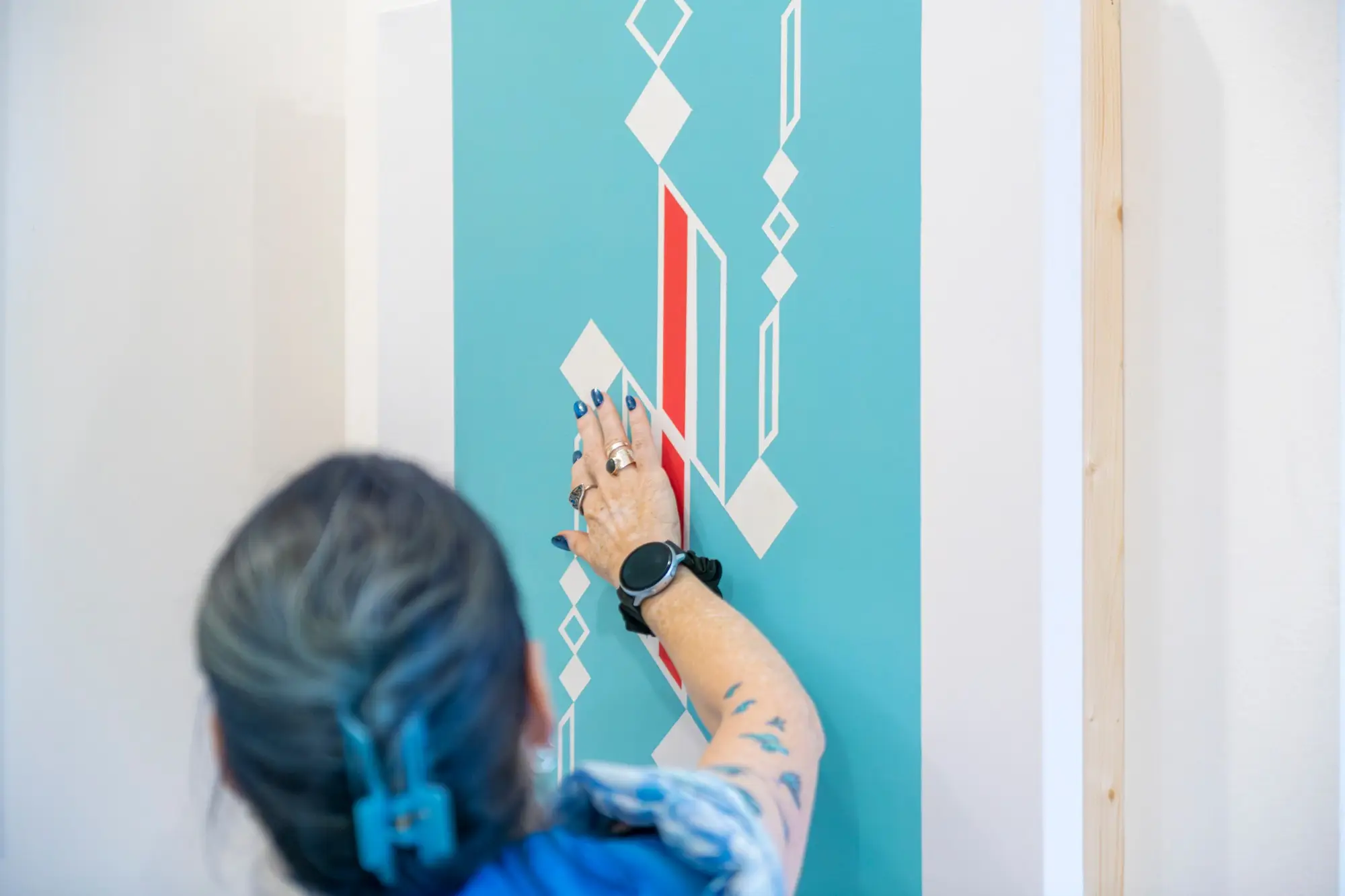 Sounding Canvas: A Networked Social Artwork Bridging Distant Communities through Tactile Interaction