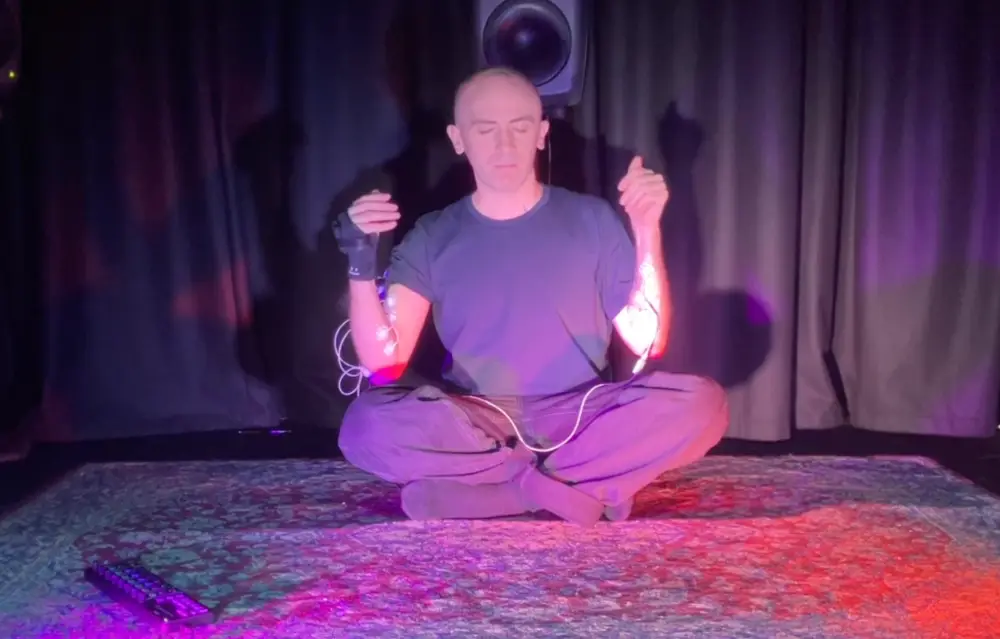 A Body Knows the Pattern: A Performance System Exploring Embodied Rhythm and Phrasing via NIME