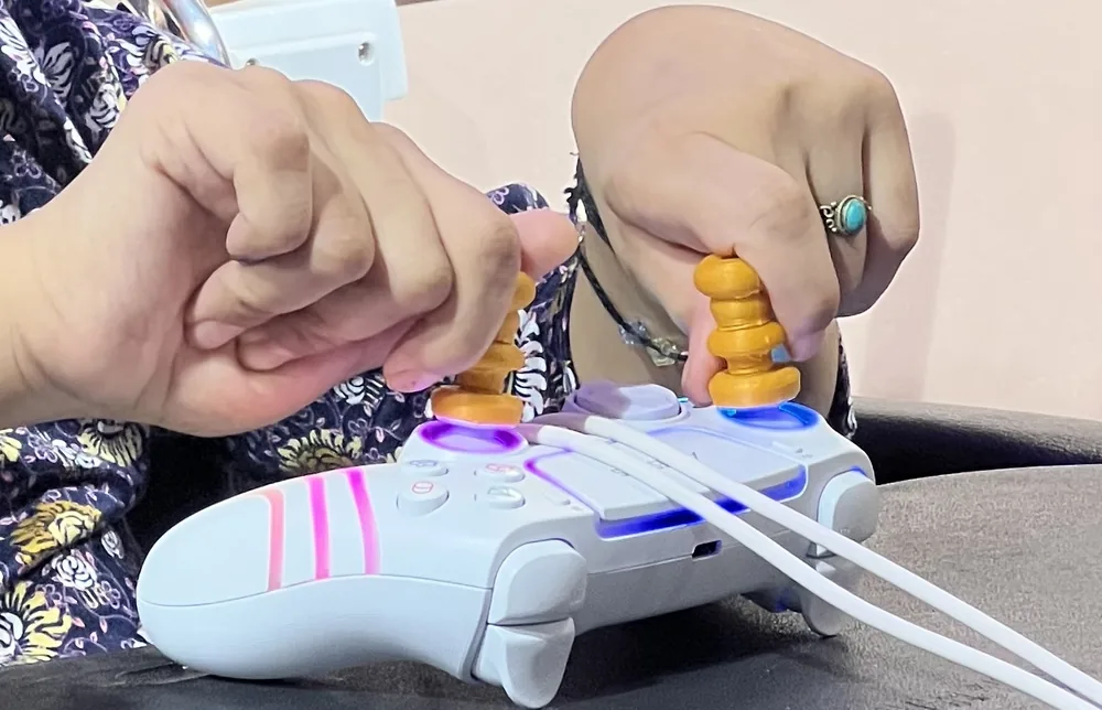 Scalable Accessible Music-Making with Commodity Controllers and Modular Augmentations in Resource-Constrained Settings